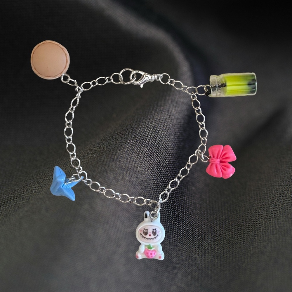Silver Plated Charm Bracelet with Colorful Charms; 7 inches.